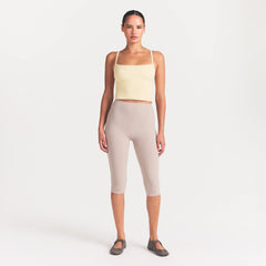 NikeSKIMS RIBBED SEAMLESS CAMI | LEMON DROP ON A MODEL FRONT VIEW @ | FOCUS: 0.0, 1.0, 0.9