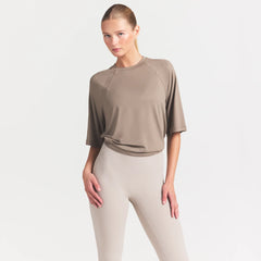 NikeSKIMS AIRY DRI-FIT OVERSIZED T-SHIRT | DRIFTWOOD ON A MODEL SIDE VIEW @ | FOCUS: 0.0, 1.0, 0.9