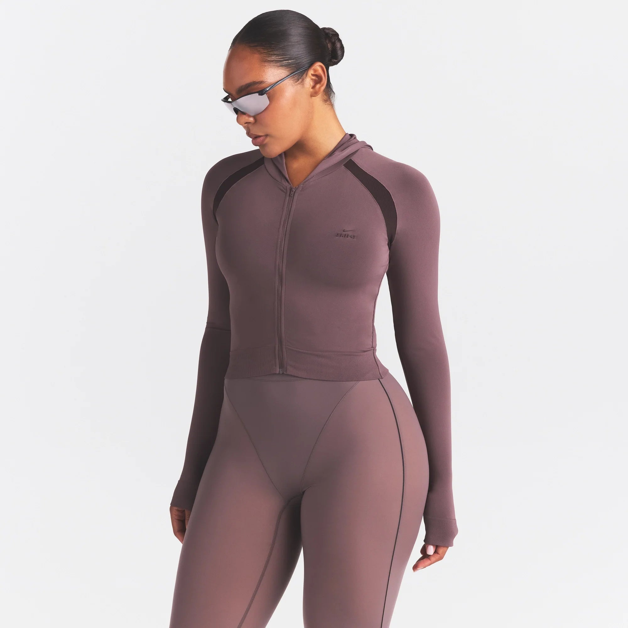 NikeSKIMS STRETCH KNIT SHRUNKEN ZIP HOODIE | RESIN ON A MODEL SIDE VIEW @ | FOCUS: 0.0, 1.0, 0.9