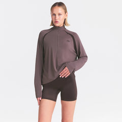 NikeSKIMS STRETCH KNIT LONG SLEEVE HALF ZIP | RESIN ON A MODEL SIDE VIEW @ | FOCUS: 0.0, 1.0, 0.9