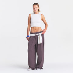 NikeSKIMS RIBBED SEAMLESS MUSCLE TANK | IVORY ON A MODEL FRONT VIEW @ | FOCUS: 0.0, 1.0, 0.9