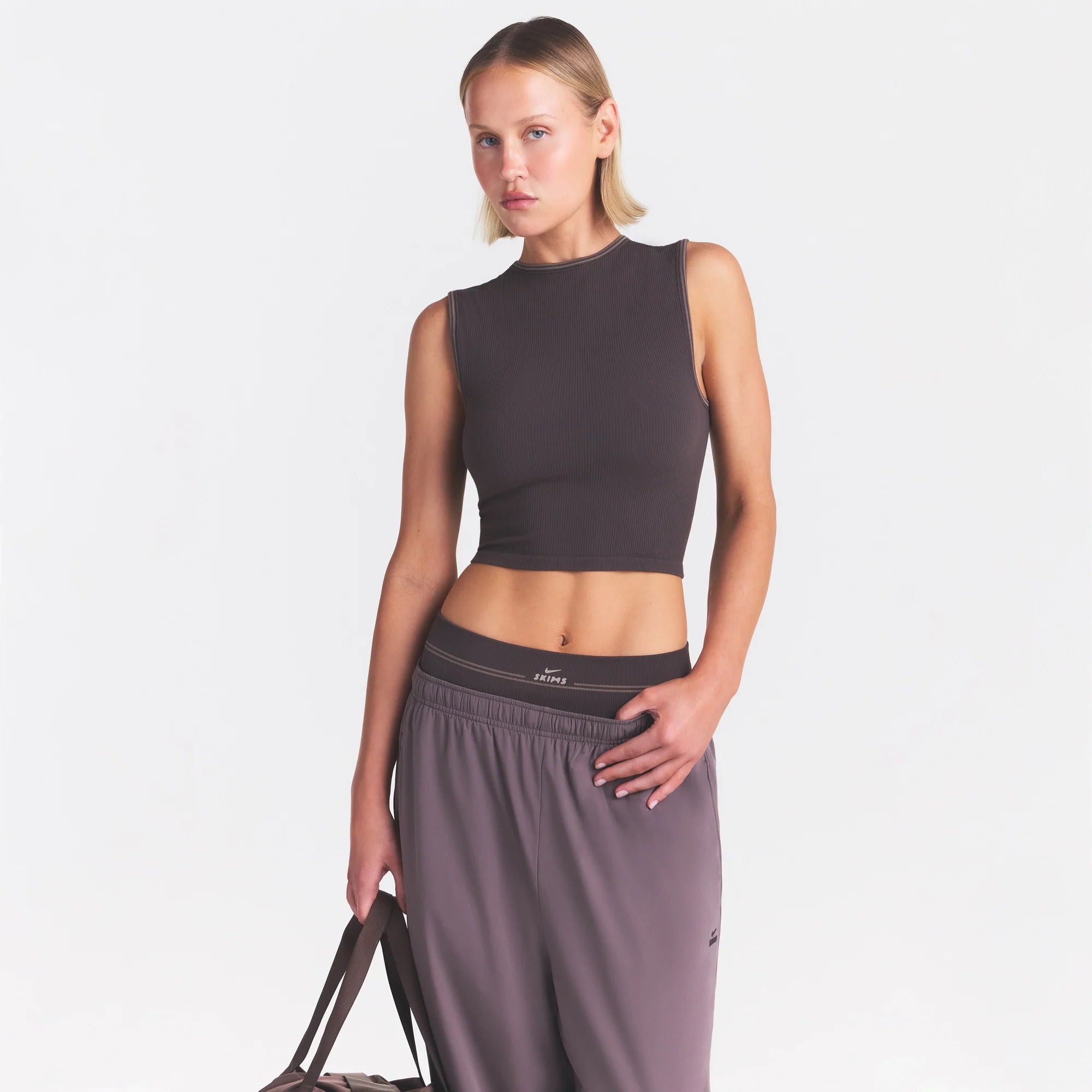 NikeSKIMS RIBBED SEAMLESS MUSCLE TANK | PHOENIX ON A MODEL SIDE VIEW @ | FOCUS: 0.0, 1.0, 0.9
