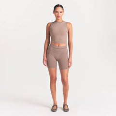 NikeSKIMS RIBBED SEAMLESS MUSCLE TANK | DRIFTWOOD ON A MODEL FRONT VIEW @ | FOCUS: 0.0, 1.0, 0.9