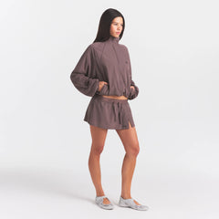 NikeSKIMS STRETCH NYLON OVERSIZED JACKET | RESIN ON A MODEL FRONT VIEW @ | FOCUS: 0.0, 1.0, 0.9