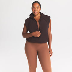 NikeSKIMS STRETCH NYLON OVERSIZED VEST | DARK ROAST ON A MODEL SIDE VIEW @ | FOCUS: 0.0, 1.0, 0.9