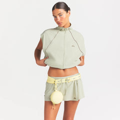 NikeSKIMS STRETCH NYLON OVERSIZED VEST | TALC ON A MODEL SIDE VIEW @ | FOCUS: 0.0, 1.0, 0.9