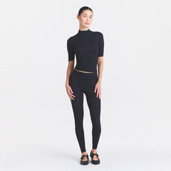 NikeSKIMS WEIGHTLESS LAYERS MOCK NECK SHORT SLEEVE T-SHIRT | OBSIDIAN ON A MODEL FRONT VIEW @ | FOCUS: 0.0, 1.0, 0.9
