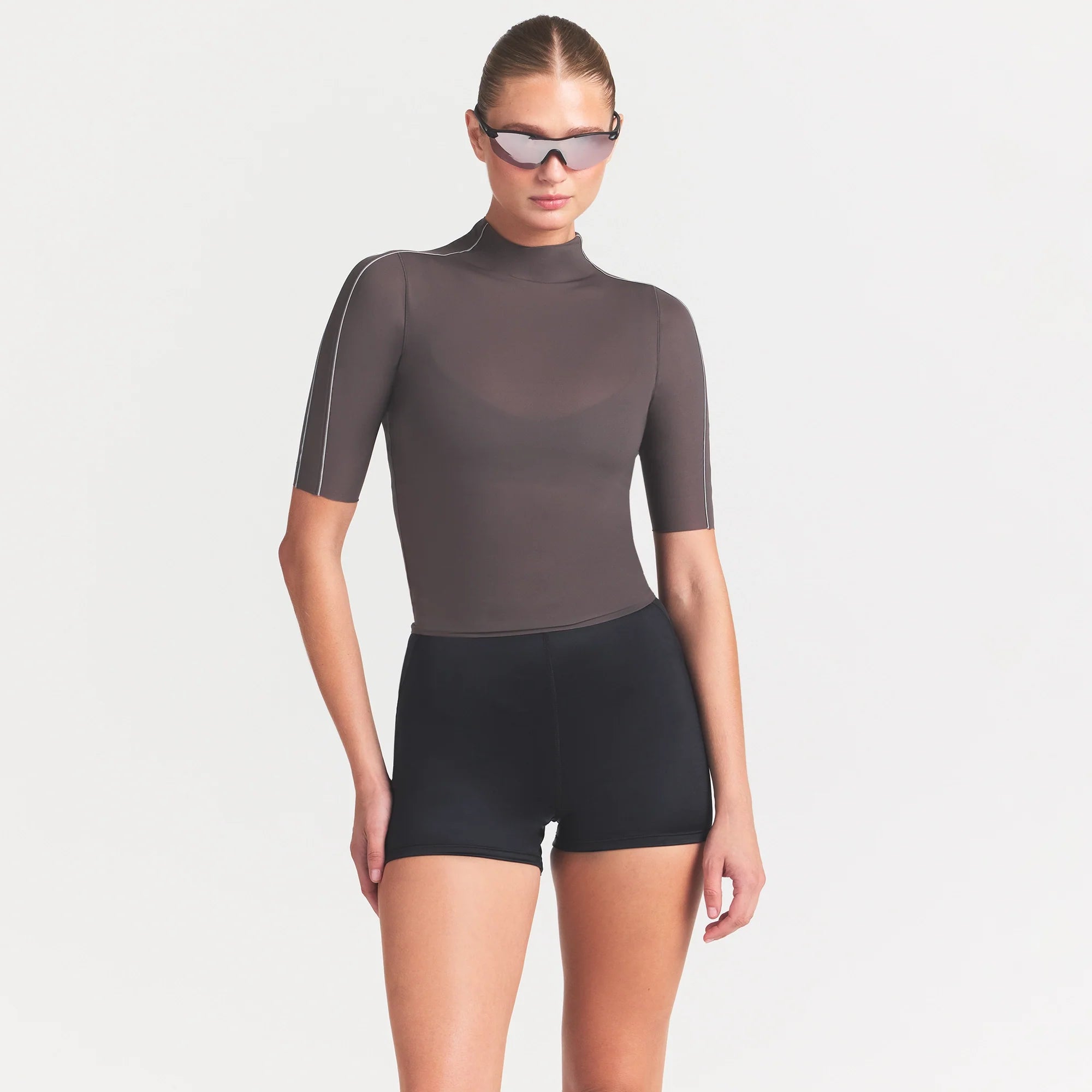 NikeSKIMS WEIGHTLESS LAYERS MOCK NECK SHORT SLEEVE T-SHIRT | BOULDER ON A MODEL SIDE VIEW @ | FOCUS: 0.0, 1.0, 0.9