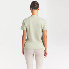 NikeSKIMS PERFORMANCE COTTON BLEND SHORT SLEEVE V-NECK TOP | TALC ON A MODEL SIDE VIEW @ | FOCUS: 0.0, 1.0, 0.9
