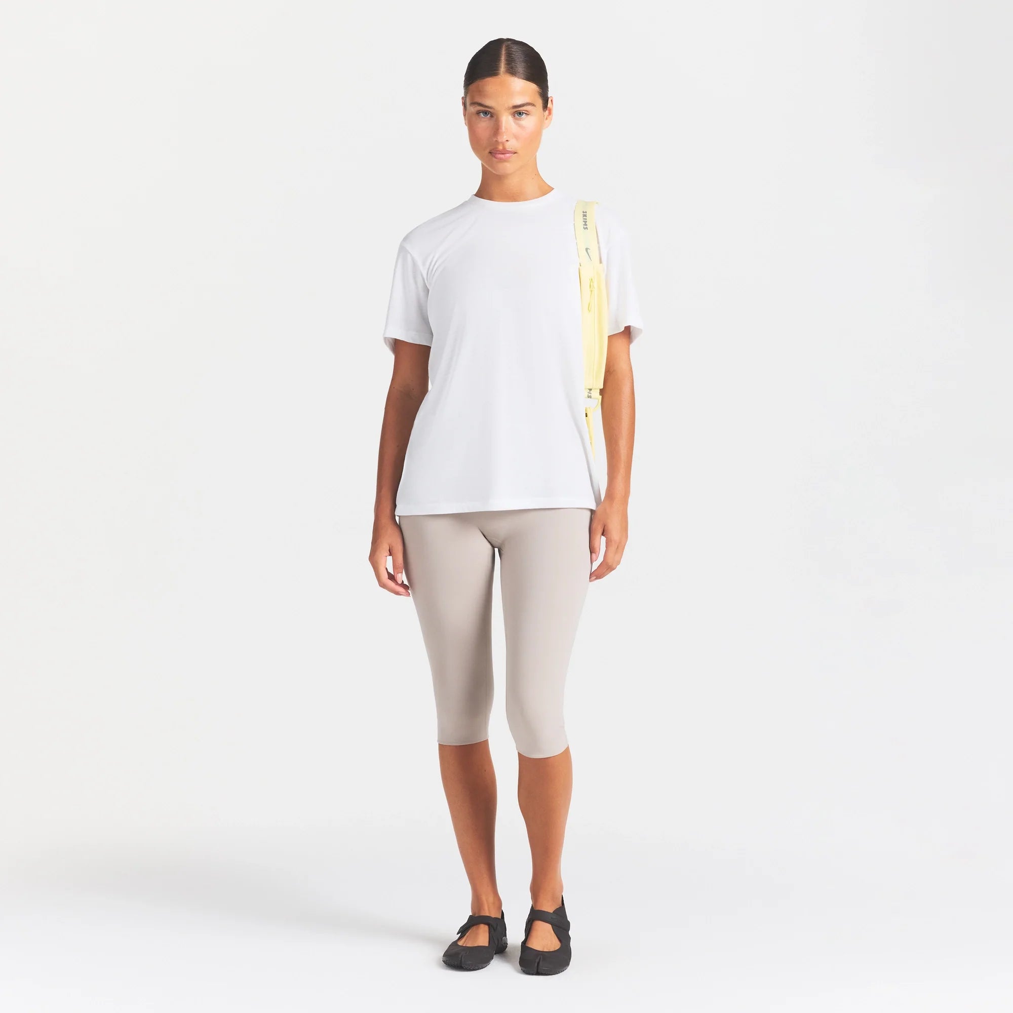 NikeSKIMS PERFORMANCE COTTON BLEND OVERSIZED SHORT SLEEVE TOP | SNOW ON A MODEL FRONT VIEW @ | FOCUS: 0.0, 1.0, 0.9