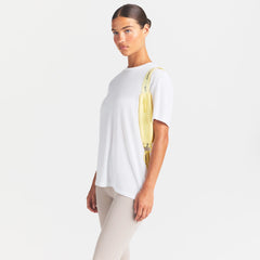 NikeSKIMS PERFORMANCE COTTON BLEND OVERSIZED SHORT SLEEVE TOP | SNOW ON A MODEL SIDE VIEW @ | FOCUS: 0.0, 1.0, 0.9
