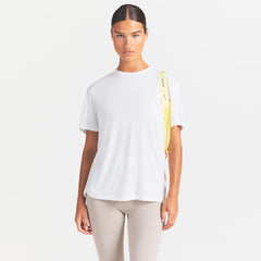 NikeSKIMS PERFORMANCE COTTON BLEND OVERSIZED SHORT SLEEVE TOP | SNOW ON A MODEL SIDE VIEW @ | FOCUS: 0.0, 1.0, 0.9