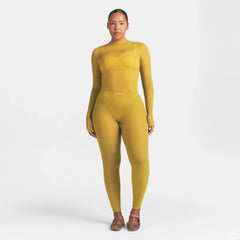 NikeSKIMS WEIGHTLESS LAYERS MOCK NECK LONG SLEEVE TOP | CITRINE ON A MODEL FRONT VIEW @ | FOCUS: 0.0, 1.0, 0.9