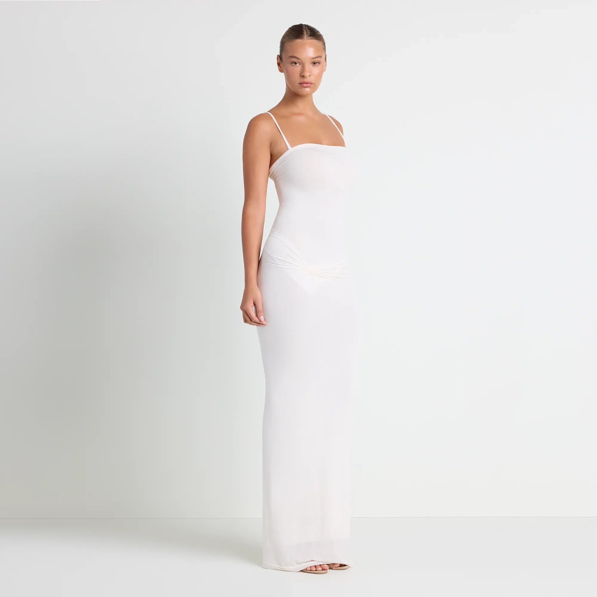 VETTESE X SKIMS SHEER MODAL LONG DRESS | ECRU ON A MODEL SIDE VIEW| FOCUS: 0.0, 1.0, 0.9 @ | FOCUS: 0.0, 1.0, 0.9
