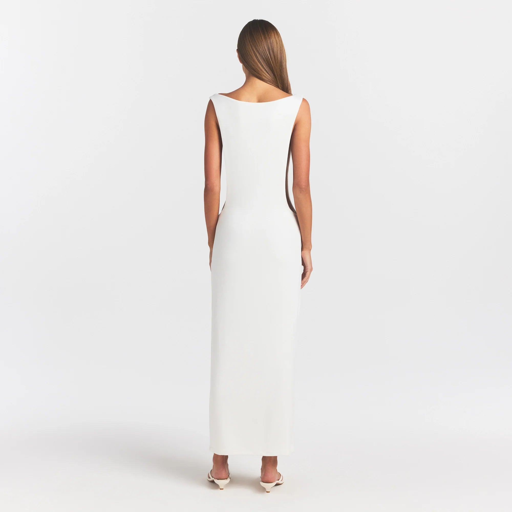 SMOOTH LAYERS CUT OUT LONG DRESS | EGRET ON A MODEL FRONT VIEW @ | FOCUS: 0.0, 1.0, 0.9