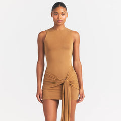 CUPRO JERSEY WRAP MINI DRESS | ALMOND ON A MODEL SIDE VIEW @ | FOCUS: 0.0, 1.0, 0.9