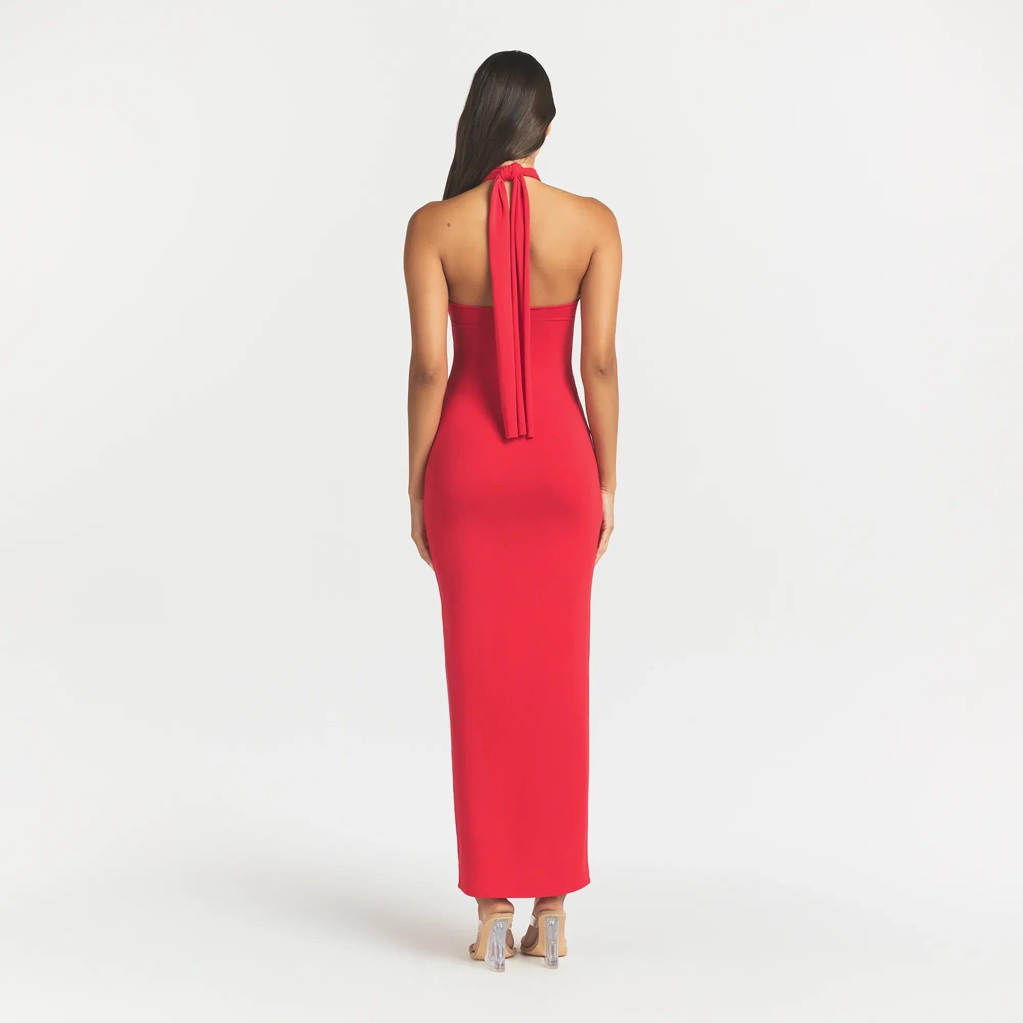 SMOOTH LAYERS CONVERTIBLE LONG DRESS | CARMINE ON A MODEL BACK VIEW @ | FOCUS: 0.0, 1.0, 0.9