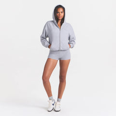 COTTON FLEECE ZIP UP ONESIE | HEATHER GREY ON A MODEL FRONT VIEW @ | FOCUS: 0.0, 1.0, 0.9