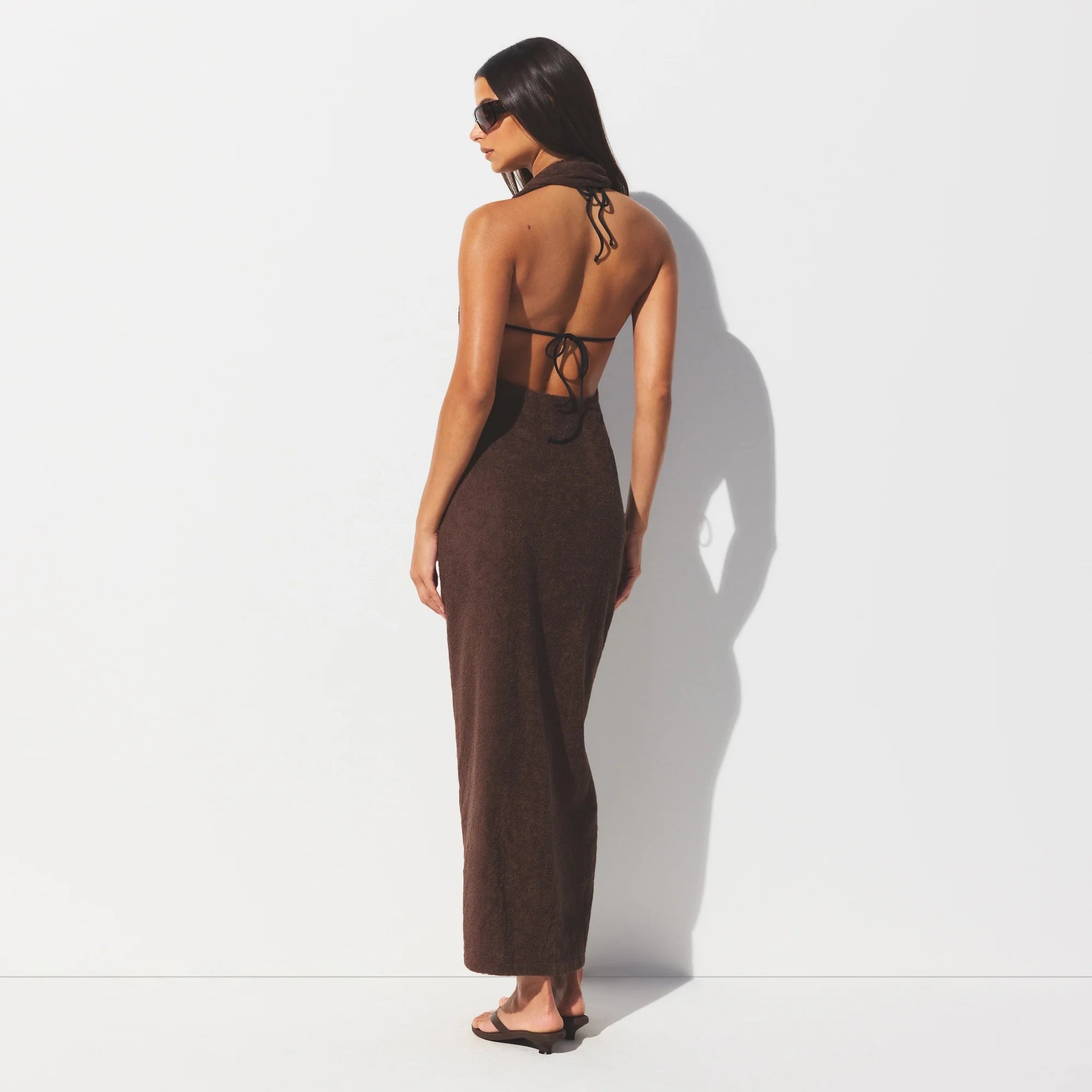 TERRY COVER-UPS DEEP PLUNGE HALTER WRAP DRESS | DARK SEPIA ON A MODEL FRONT VIEW @ | FOCUS: 0.0, 1.0, 0.9 