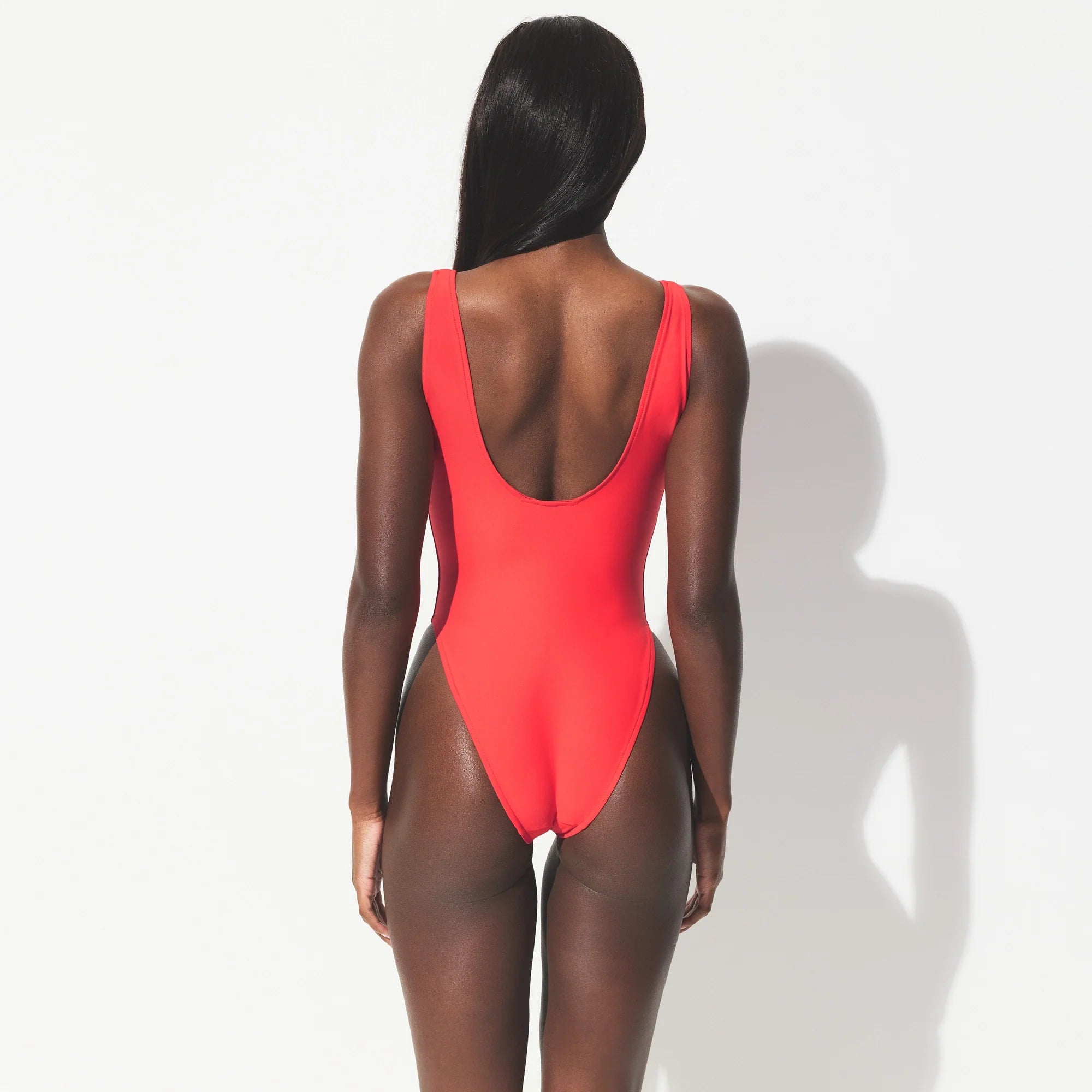 ICONIC SWIM SQUARE NECK ONE PIECE | CARMINE ON A MODEL SIDE VIEW 