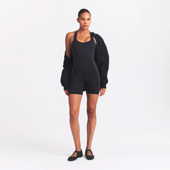 NikeSKIMS MATTE AND SHINE RACERBACK 5" ONE PIECE | OBSIDIAN/IGNEOUS ON A MODEL FRONT VIEW @ | FOCUS: 0.0, 1.0, 0.9