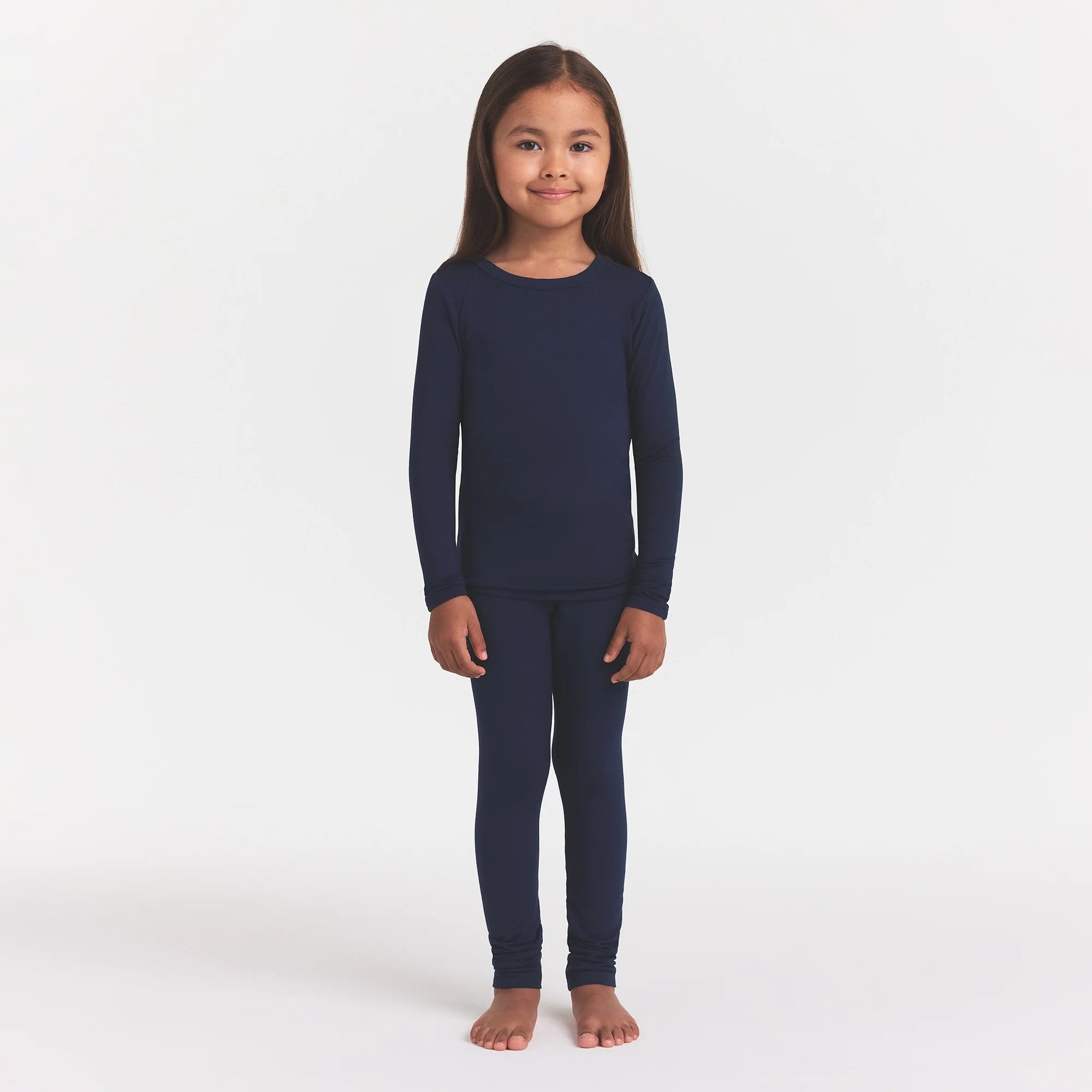 SKIMS SLEEP KIDS SLEEP SET | NAVY ON A MODEL FRONT VIEW