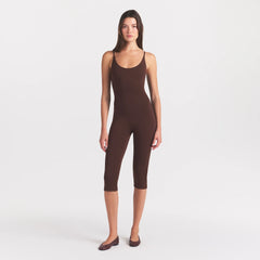 SMOOTH LAYERS CAPRI CATSUIT | COCOA ON A MODEL FRONT VIEW @ | FOCUS: 0.0, 1.0, 0.9