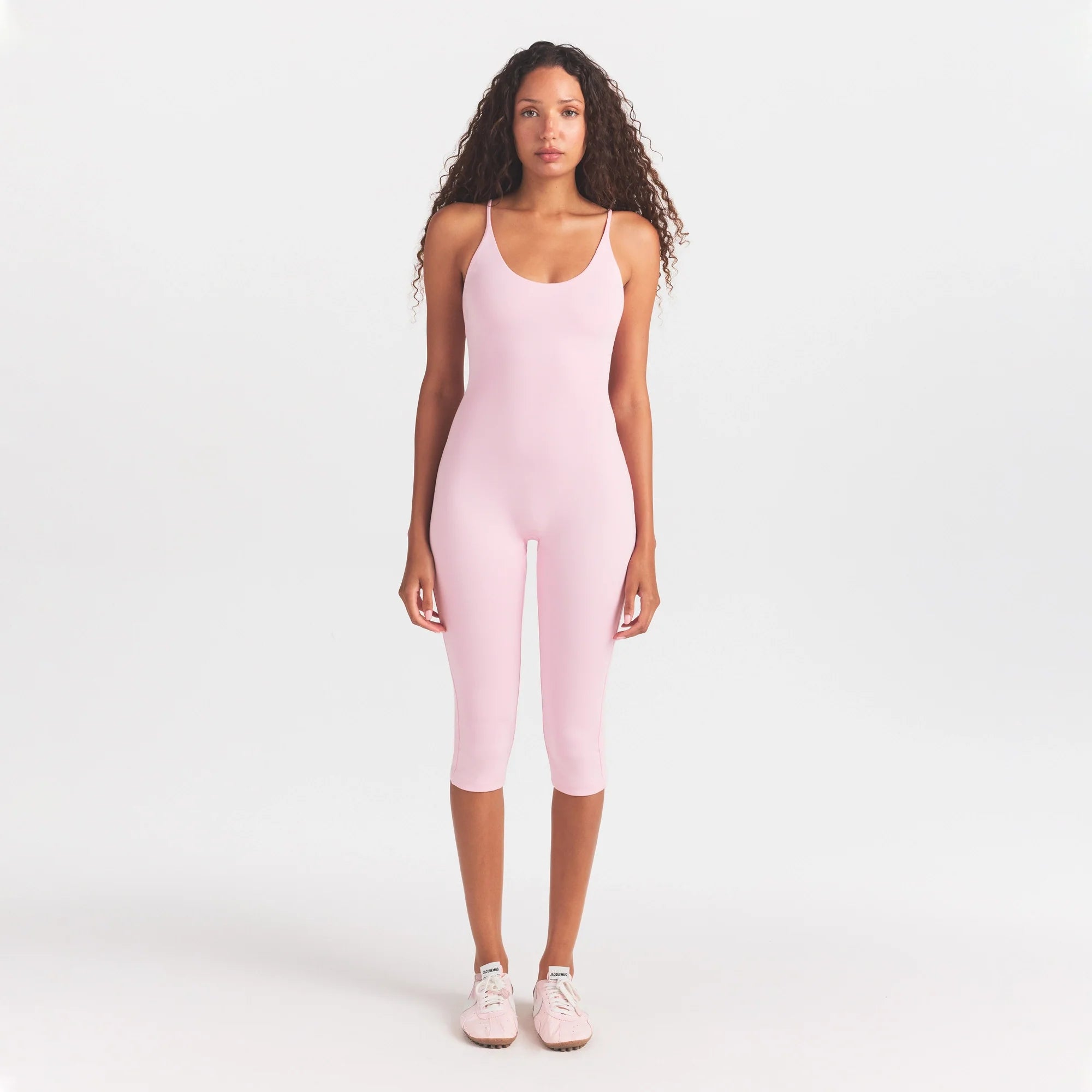 SMOOTH LAYERS CAPRI CATSUIT | PEONY ON A MODEL FRONT VIEW @ | FOCUS: 0.0, 1.0, 0.9