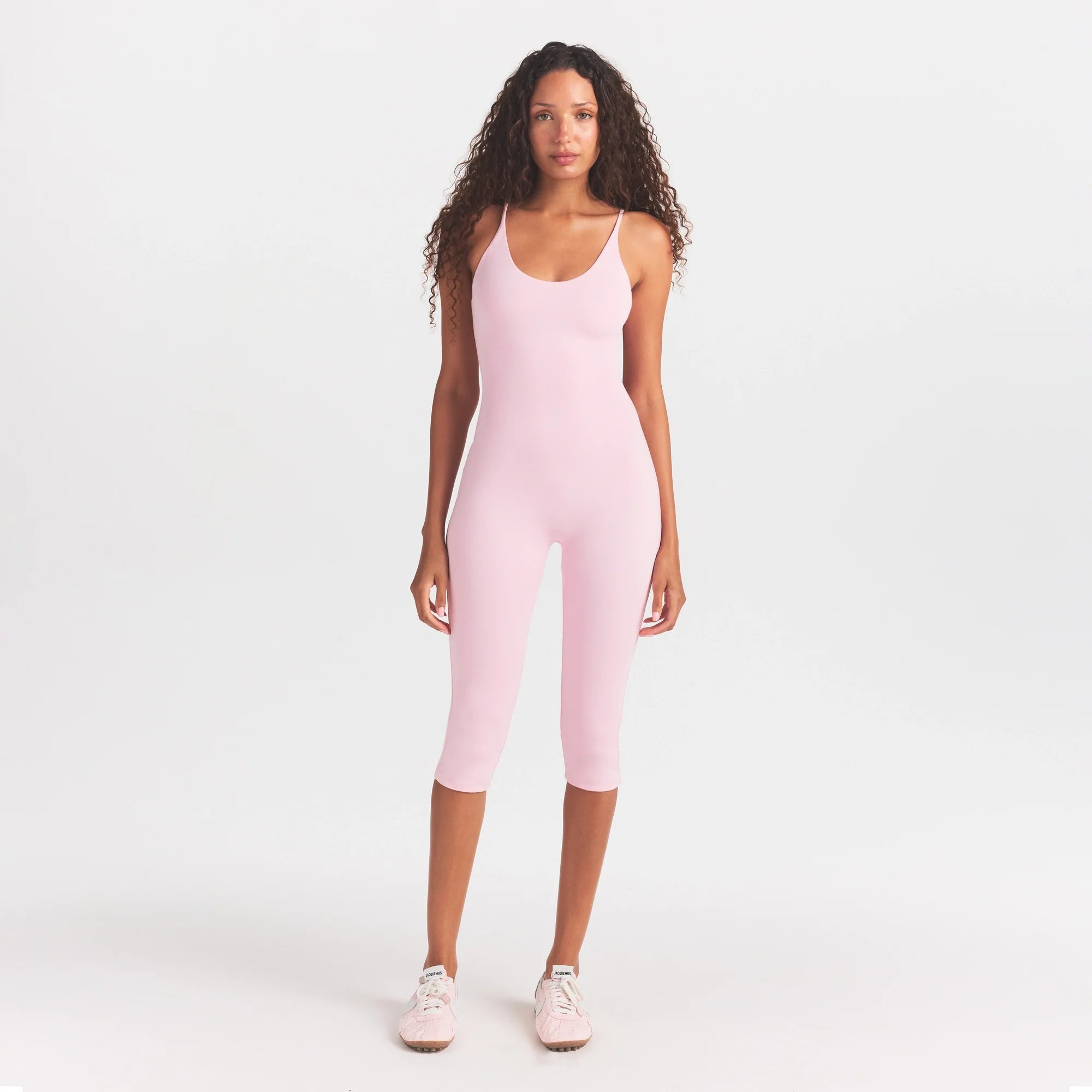 SMOOTH LAYERS CAPRI CATSUIT | PEONY ON A MODEL FRONT VIEW @ | FOCUS: 0.0, 1.0, 0.9