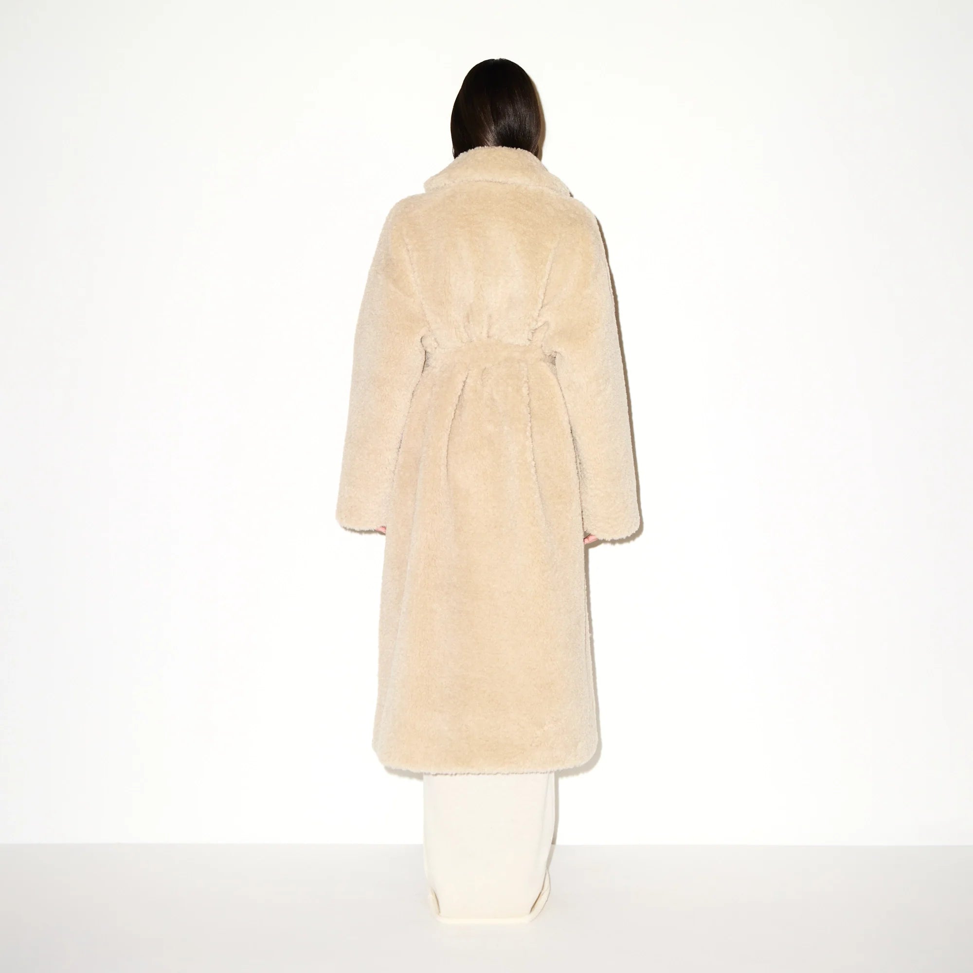 FAUX FUR OVERSIZED LONG COAT | CHAMPAGNE ON A MODEL FRONT VIEW  @ | FOCUS: 0.9, 0.1, 0.7