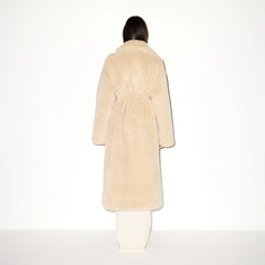 FAUX FUR OVERSIZED LONG COAT | CHAMPAGNE ON A MODEL FRONT VIEW  @ | FOCUS: 0.9, 0.1, 0.7