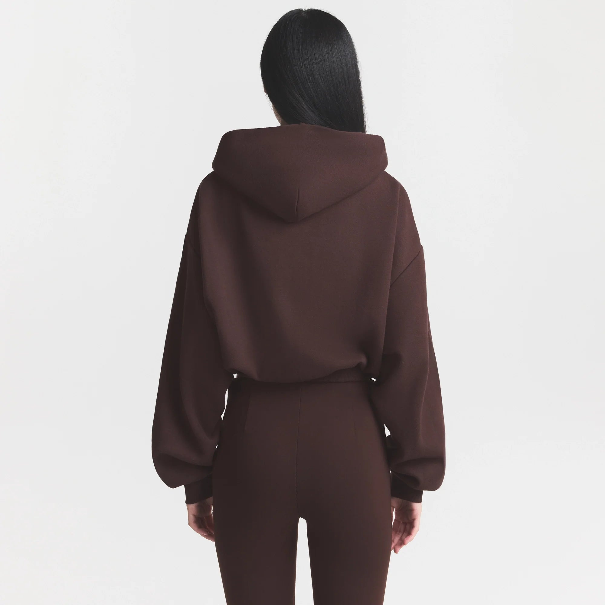 COTTON FLEECE CROPPED HOODIE | ESPRESSO ON A MODEL SIDE VIEW @ | FOCUS: 0.0, 1.0, 0.9