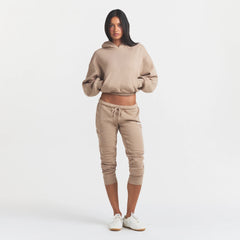COTTON FLEECE CROPPED HOODIE | LATTE ON A MODEL FRONT VIEW @ | FOCUS: 0.0, 1.0, 0.9