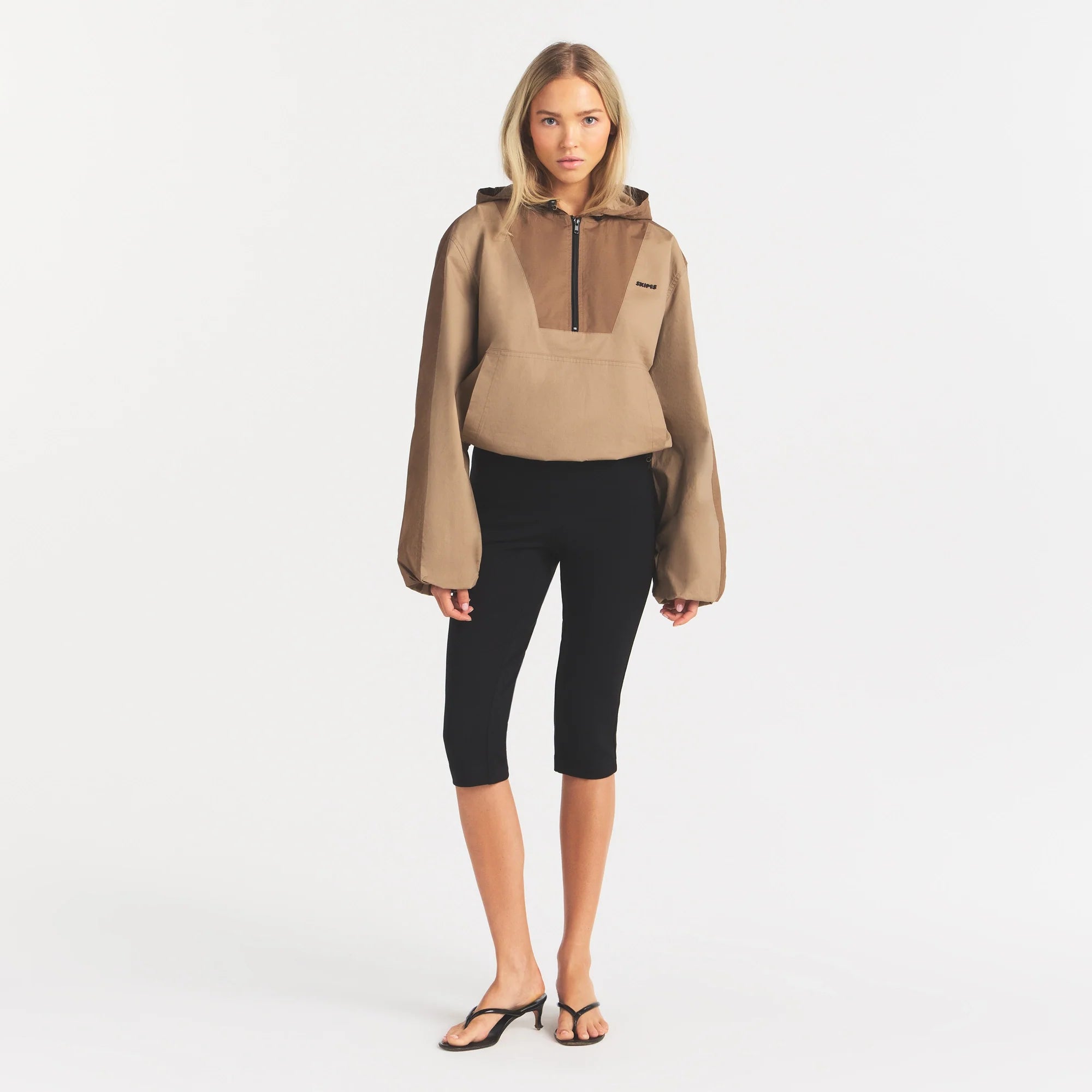 WOVEN COTTON HALF ZIP PULLOVER | DESERT ON A MODEL FRONT VIEW @ | FOCUS: 0.0, 1.0, 0.9