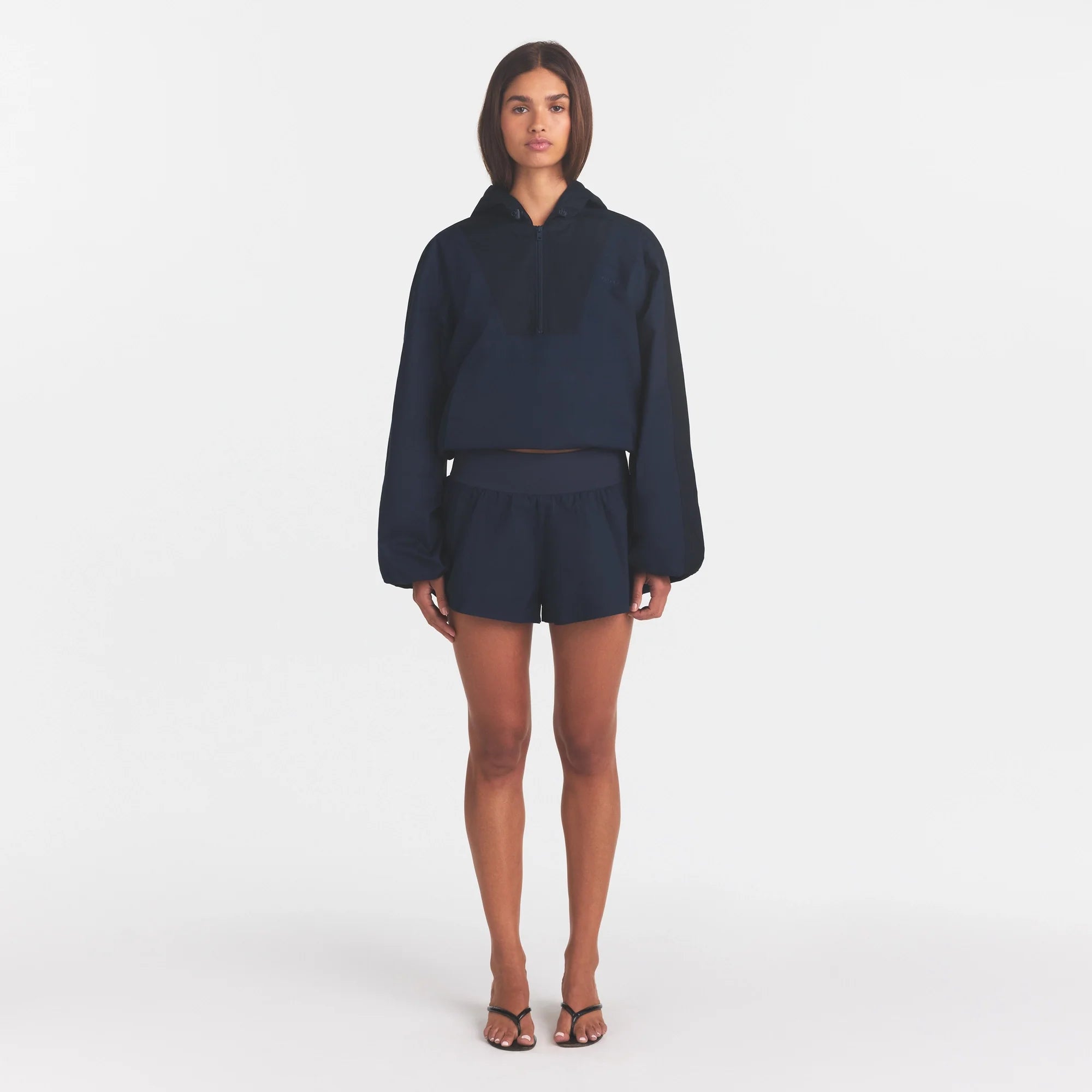 WOVEN COTTON HALF ZIP PULLOVER | NAVY ON A MODEL FRONT VIEW @ | FOCUS: 0.0, 1.0, 0.9