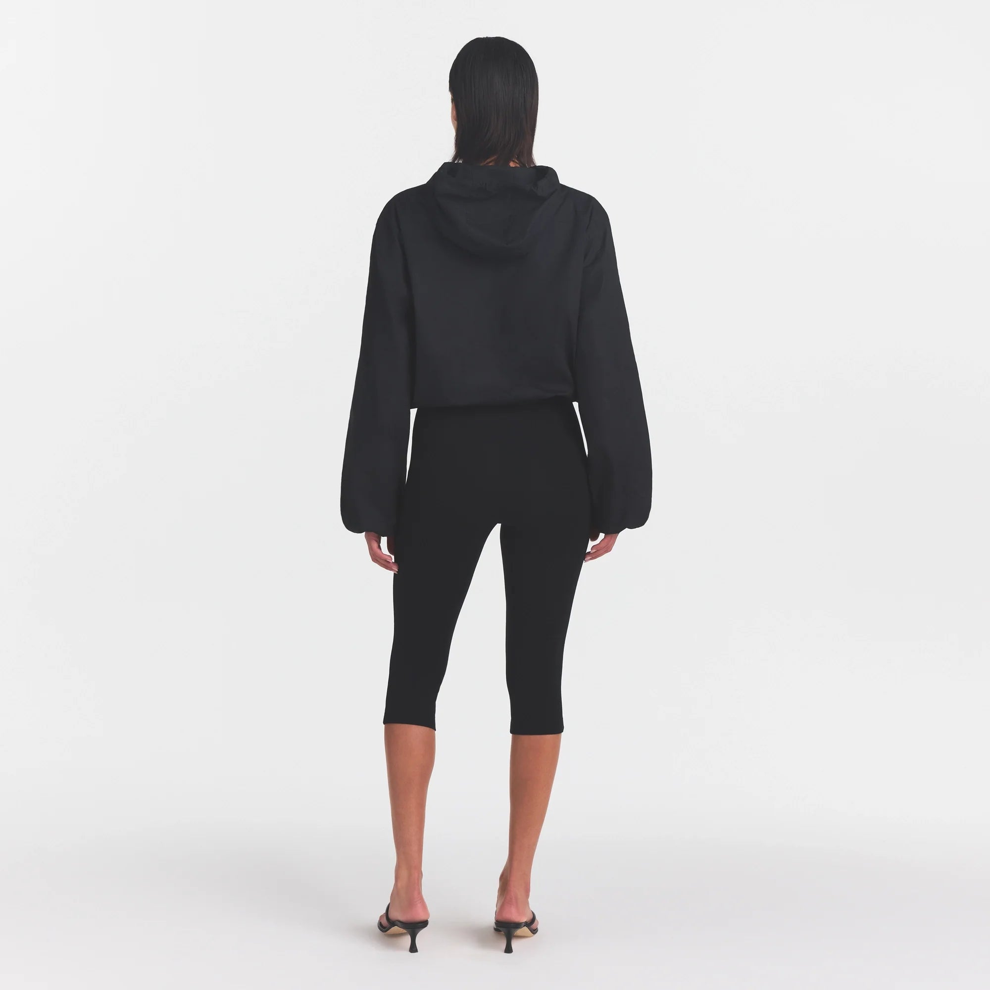 WOVEN COTTON HALF ZIP PULLOVER | ONYX ON A MODEL FRONT VIEW @ | FOCUS: 0.0, 1.0, 0.9