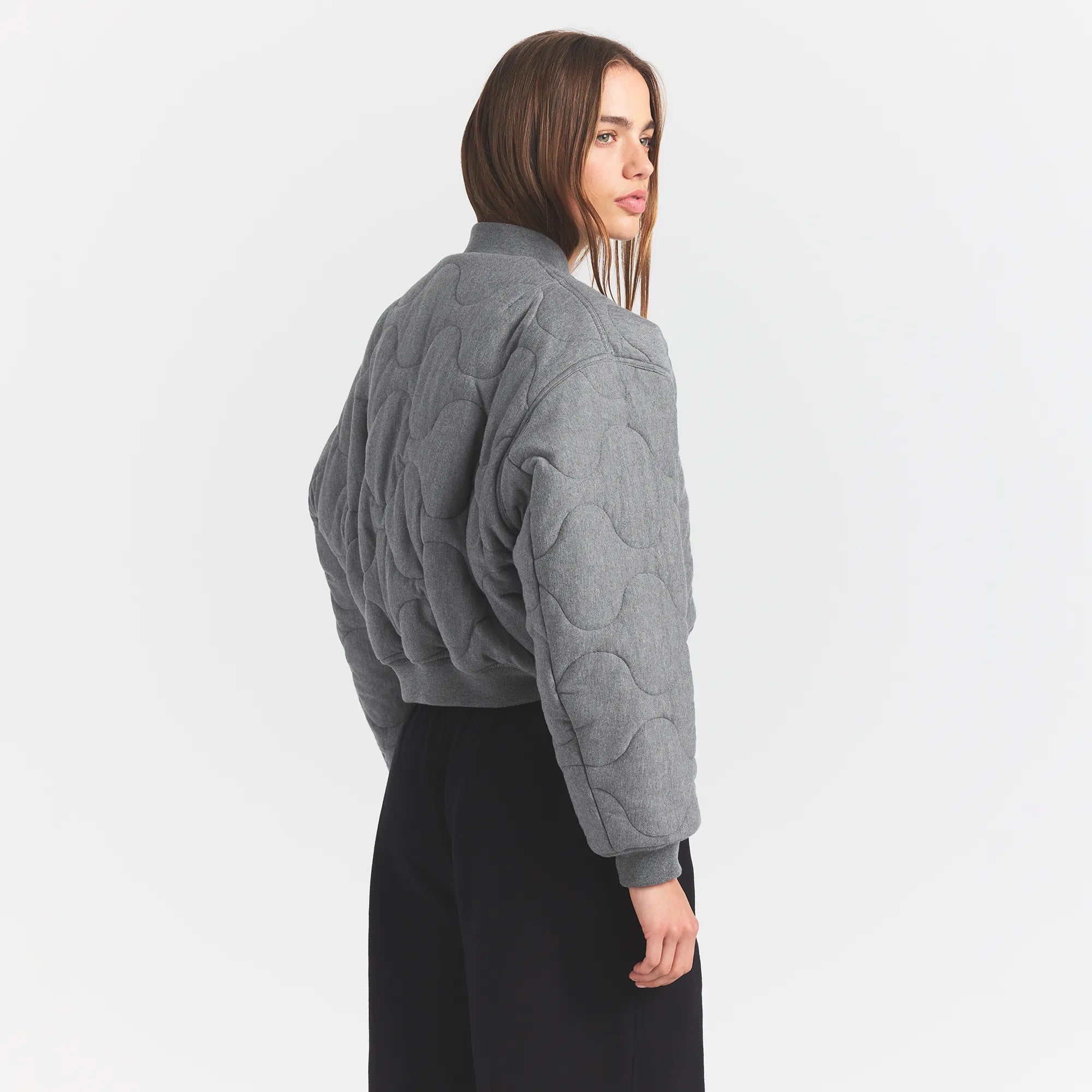 NEOPRENE OUTERWEAR REVERSIBLE BOMBER JACKET | DARK HEATHER GREY ON A MODEL SIDEVIEW @ | FOCUS: 0.0, 1.0, 0.9