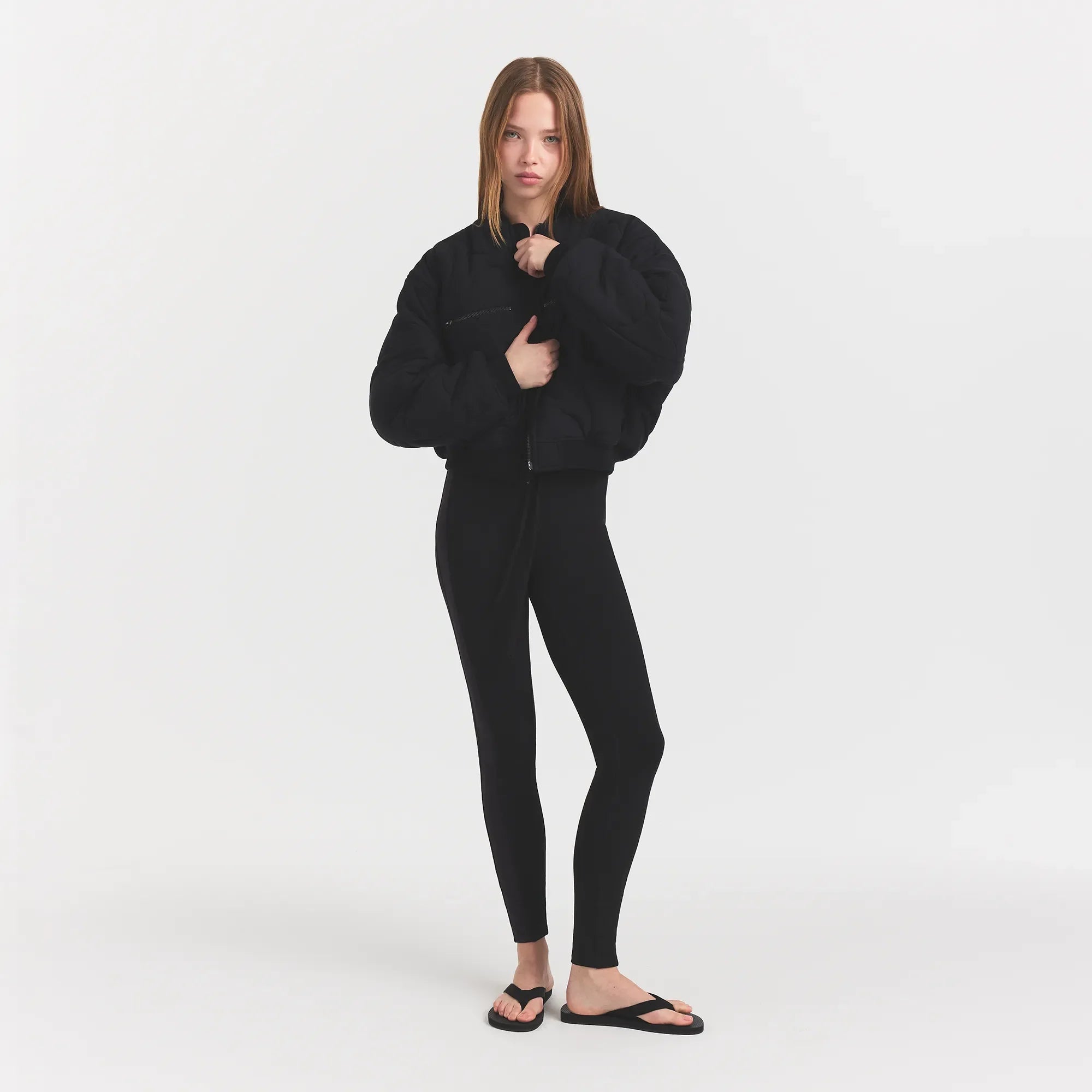 NEOPRENE OUTERWEAR REVERSIBLE BOMBER JACKET | OBSIDIAN ON A MODEL FRONTVIEW @ | FOCUS: 0.0, 1.0, 0.9
