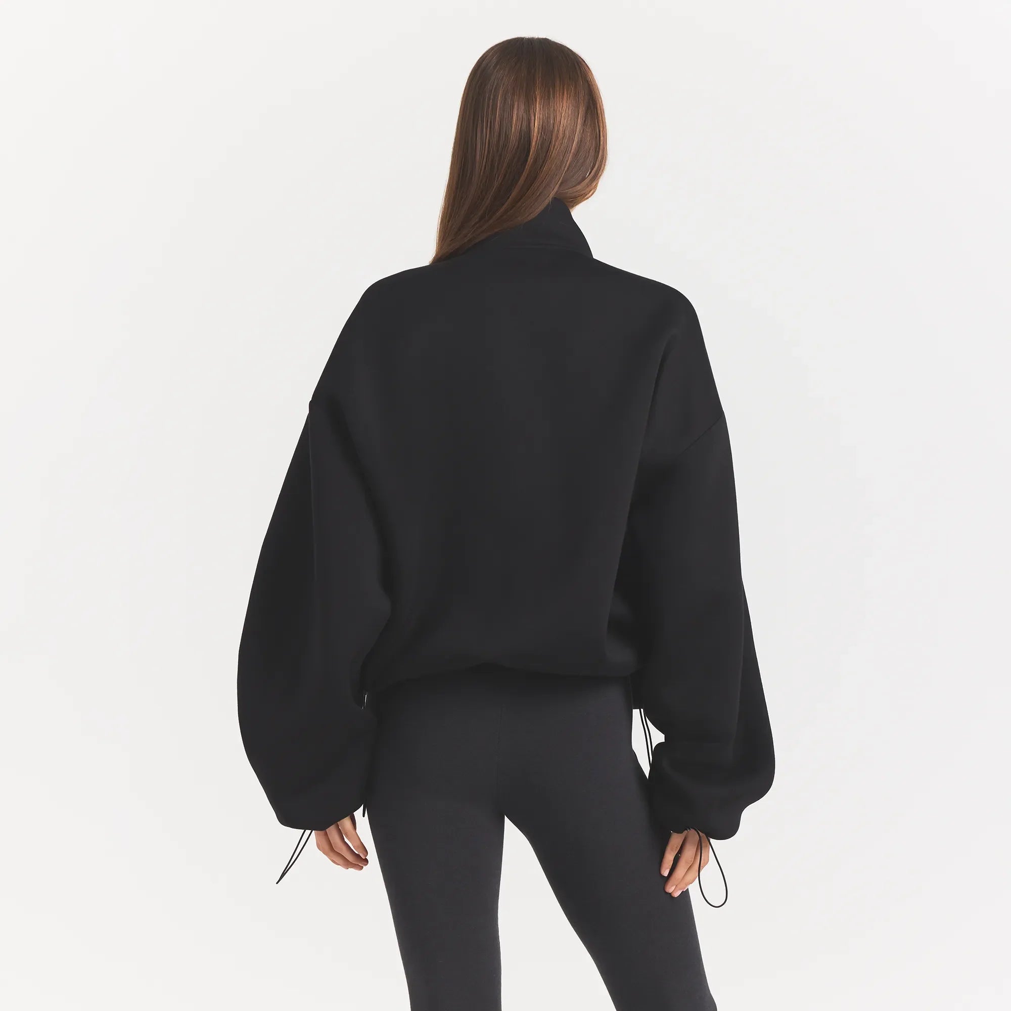 NEOPRENE OUTERWEAR OVERSIZED MOCK NECK JACKET | OBSIDIAN ON A MODEL BACK VIEW @ | FOCUS: 0.0, 1.0, 0.9