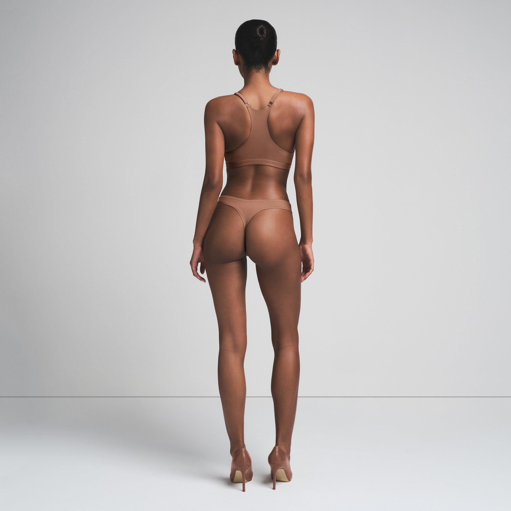 FITS EVERYBODY RACERBACK PLUNGE BRALETTE | JASPER ON A MODEL FRONT VIEW | FOCUS: 0.0, 1.0, 0.9