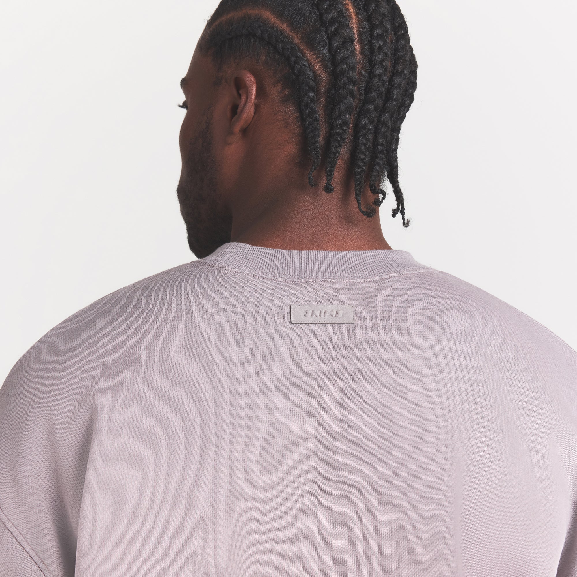 FLEECE LOUNGE MENS RELAXED HIGH CREWNECK | SHADOW ON A MODEL SIDE VIEW @ | FOCUS: 0.0, 1.0, 0.9