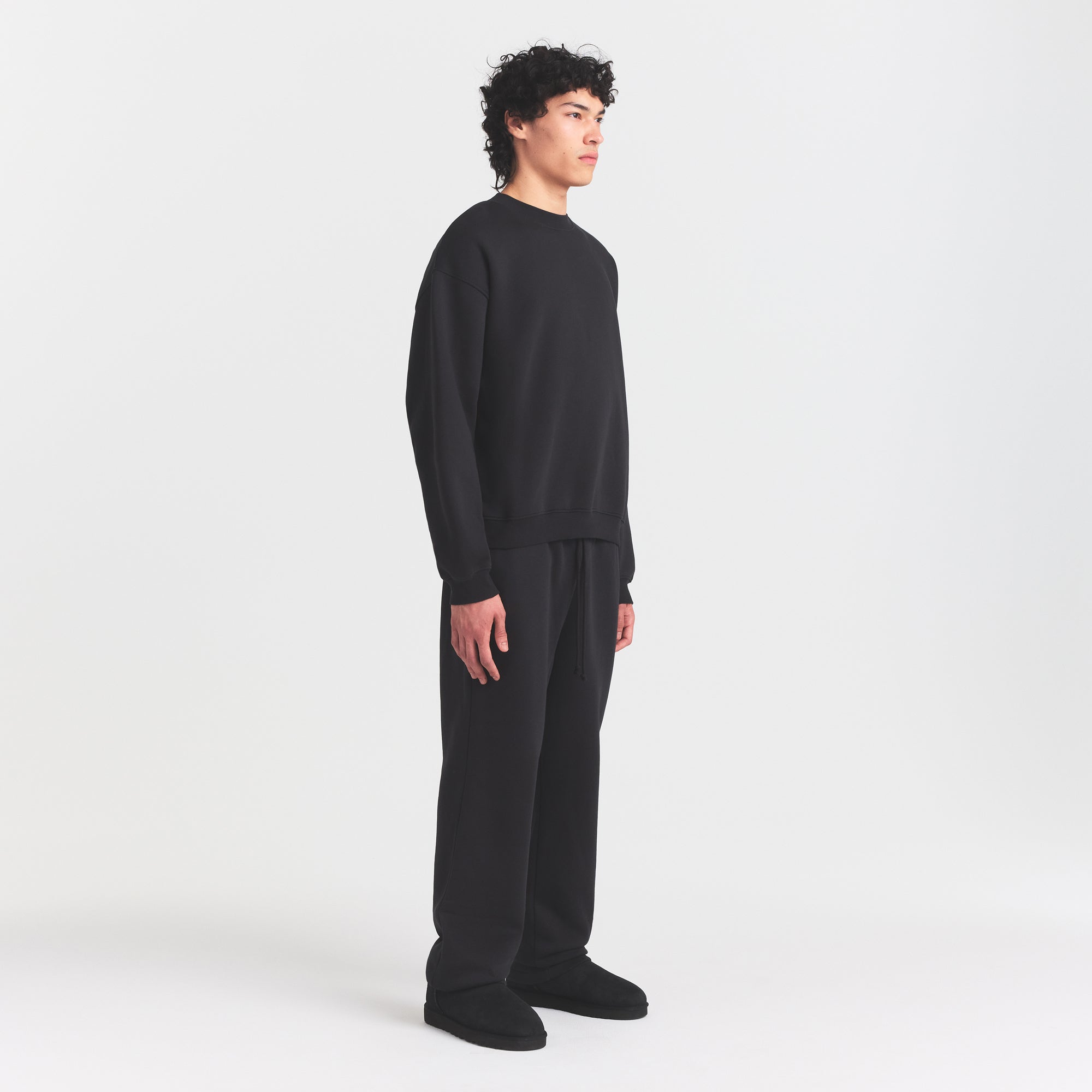 FLEECE LOUNGE MENS RELAXED HIGH CREWNECK | WASHED ONYX ON A MODEL FRONT VIEW @ | FOCUS: 0.0, 1.0, 0.9