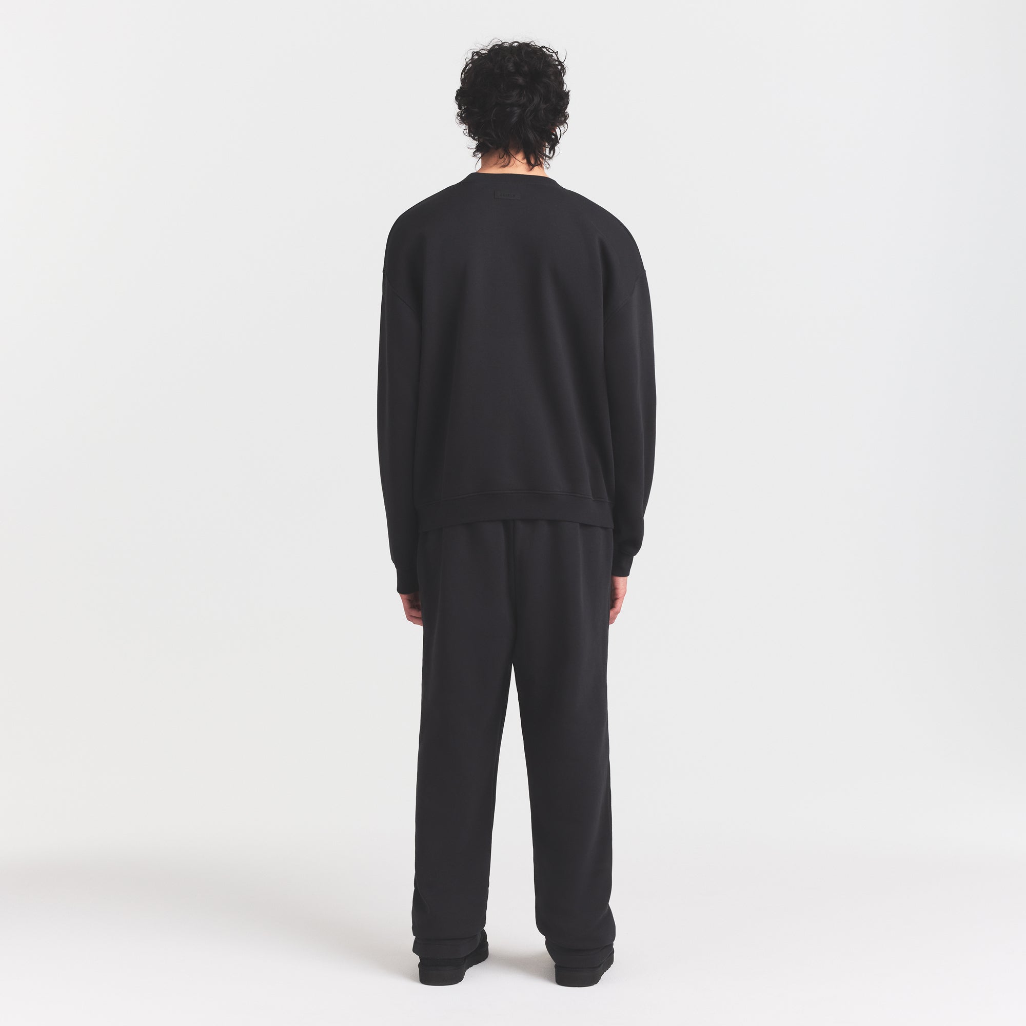FLEECE LOUNGE MENS RELAXED HIGH CREWNECK | WASHED ONYX ON A MODEL FRONT VIEW @ | FOCUS: 0.0, 1.0, 0.9