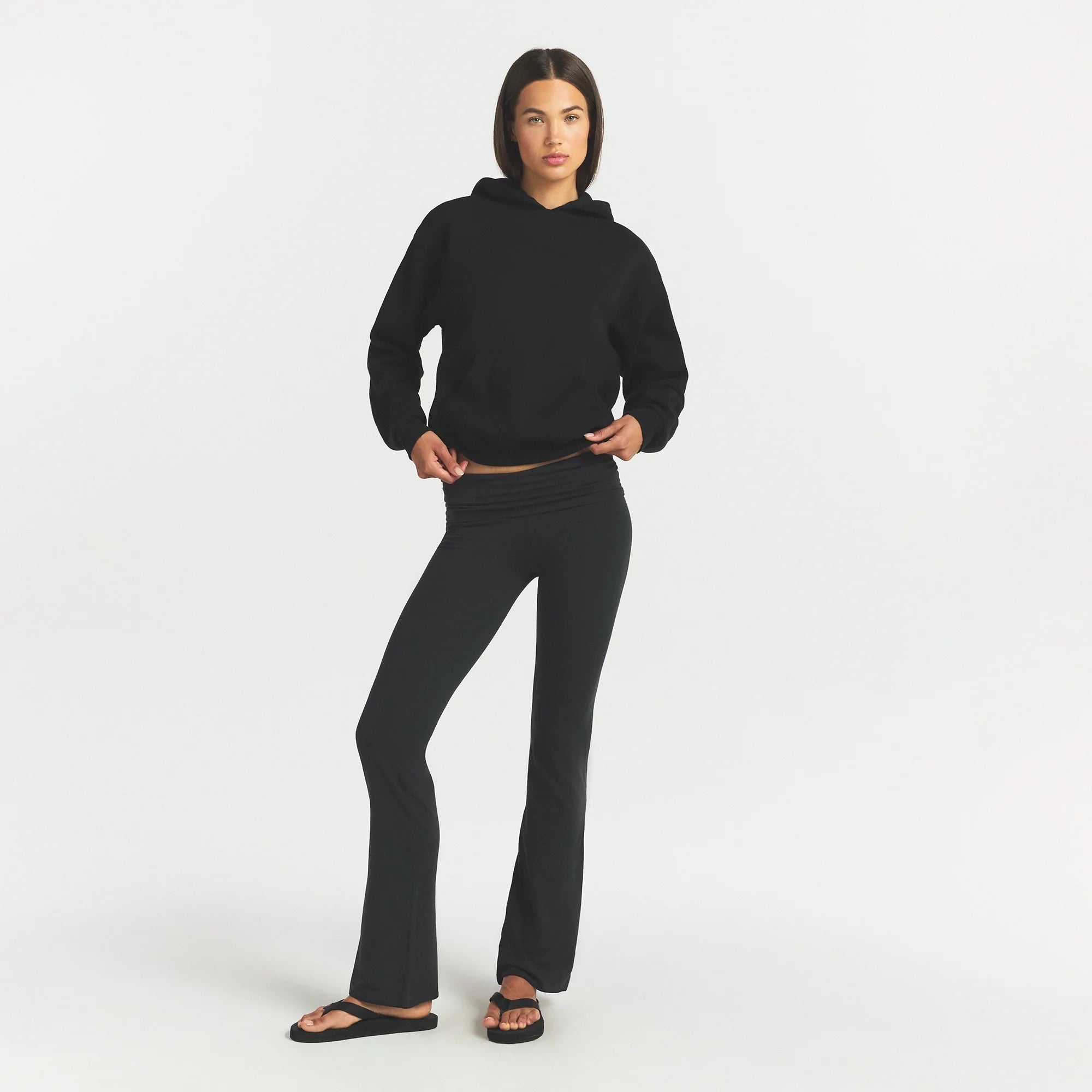 COTTON FLEECE CLASSIC HOODIE | ONYX ON A MODEL FRONT VIEW @ | FOCUS: 0.0, 1.0, 0.9