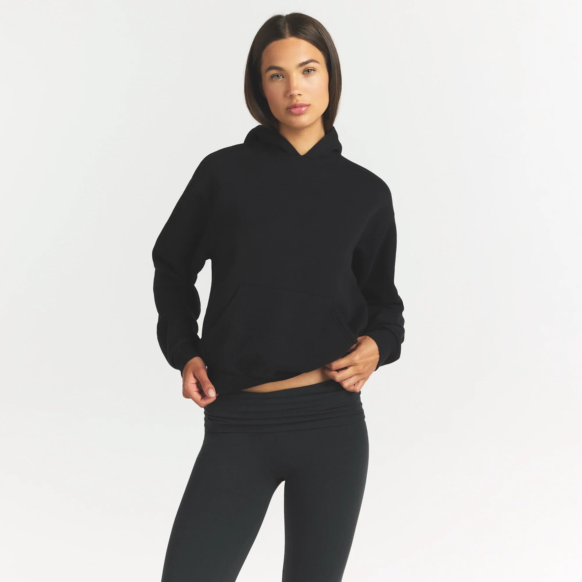 COTTON FLEECE CLASSIC HOODIE | ONYX ON A MODEL SIDE VIEW @ | FOCUS: 0.0, 1.0, 0.9