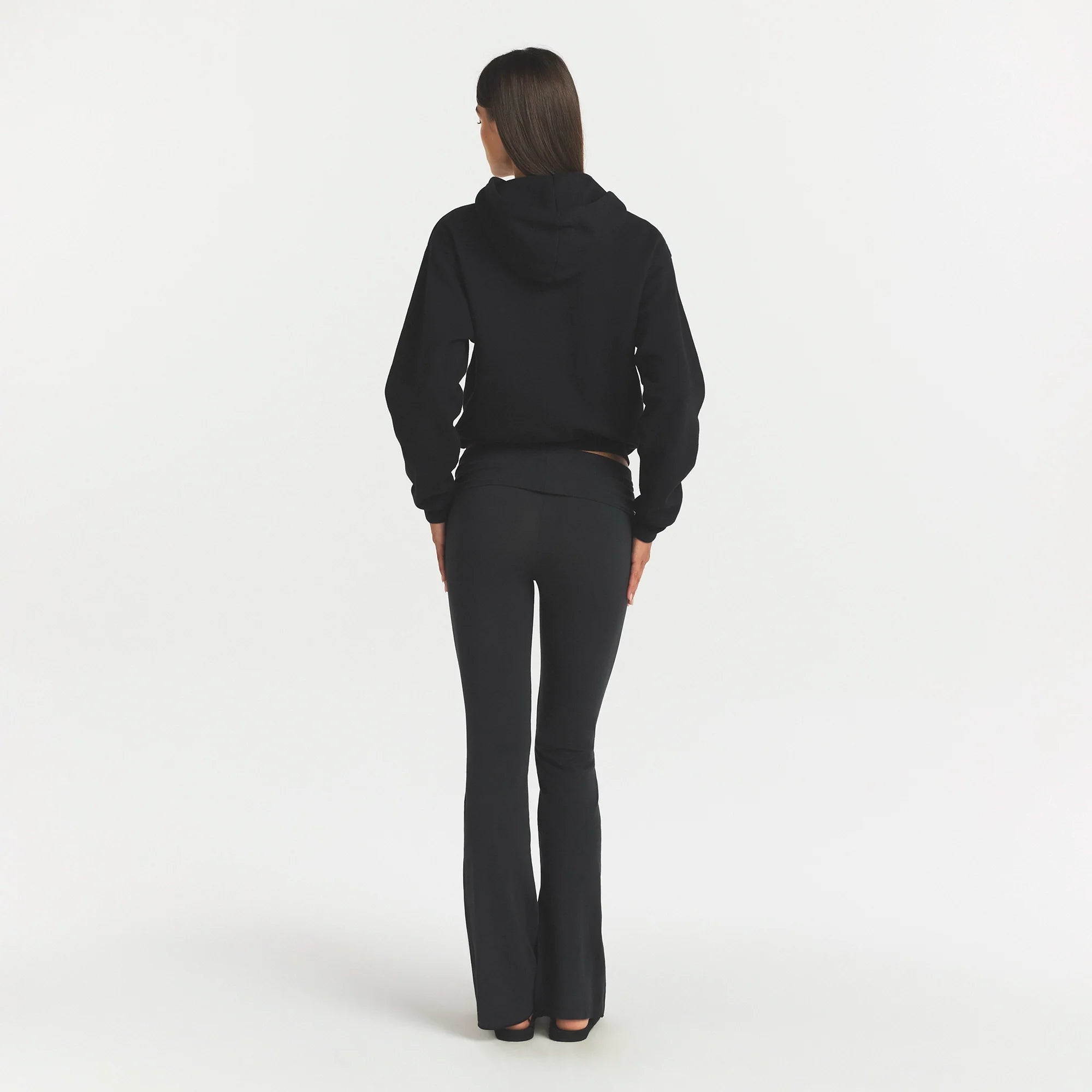 COTTON FLEECE CLASSIC HOODIE | ONYX ON A MODEL SIDE VIEW @ | FOCUS: 0.0, 1.0, 0.9