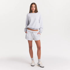 COTTON FLEECE CLASSIC CREWNECK | LIGHT HEATHER GREY ON A MODEL FRONT VIEW @ | FOCUS: 0.0, 1.0, 0.9