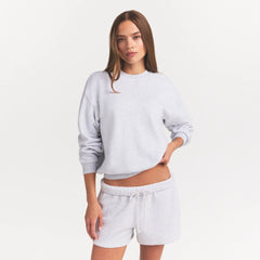 COTTON FLEECE CLASSIC CREWNECK | LIGHT HEATHER GREY ON A MODEL FRONT VIEW @ | FOCUS: 0.0, 1.0, 0.9