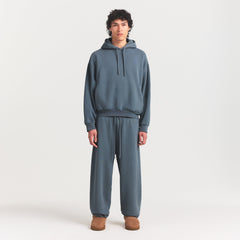 HEAVYWEIGHT FLEECE MENS HOODIE | KYANITE ON A MODEL FRONT VIEW @ | FOCUS: 0.0, 1.0, 0.9