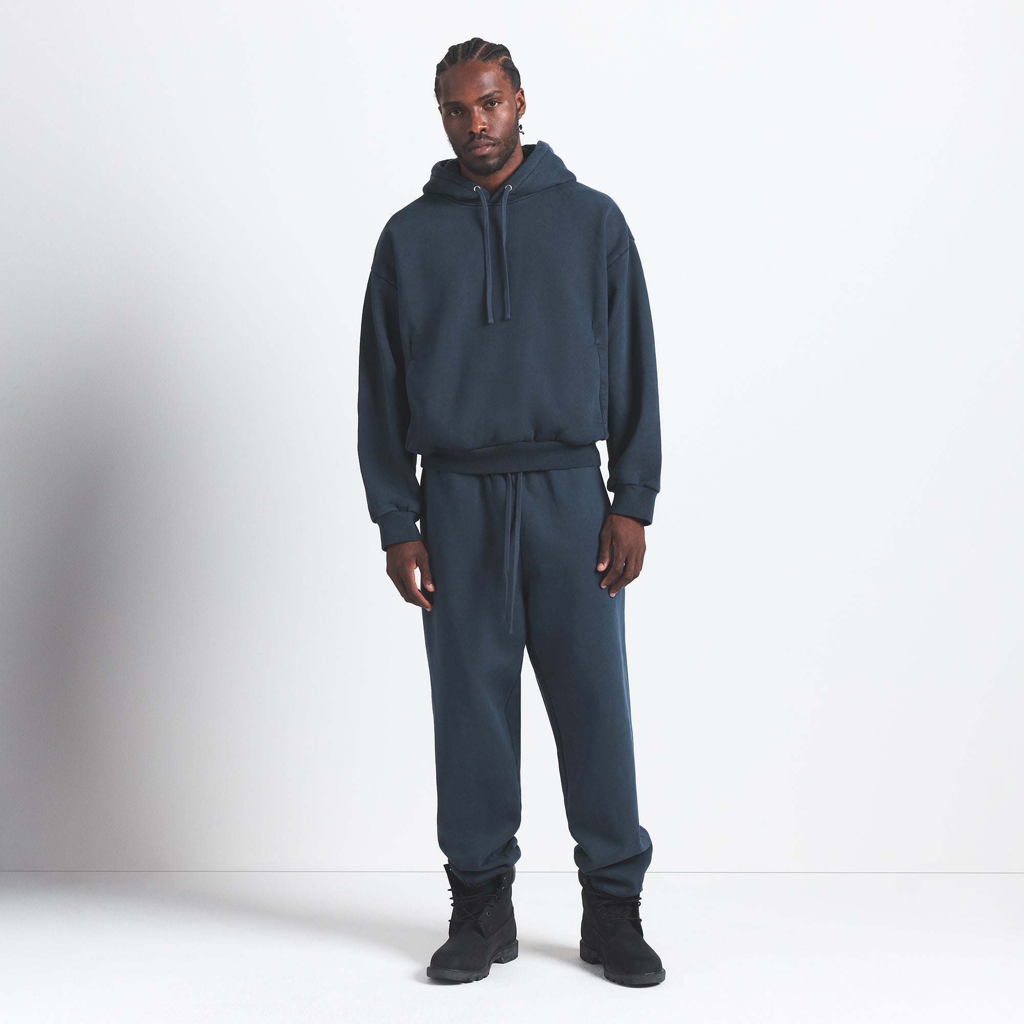 HEAVYWEIGHT FLEECE MENS HOODIE | NAVY ON A MODEL FRONT VIEW @ | FOCUS: 0.0, 1.0, 0.9